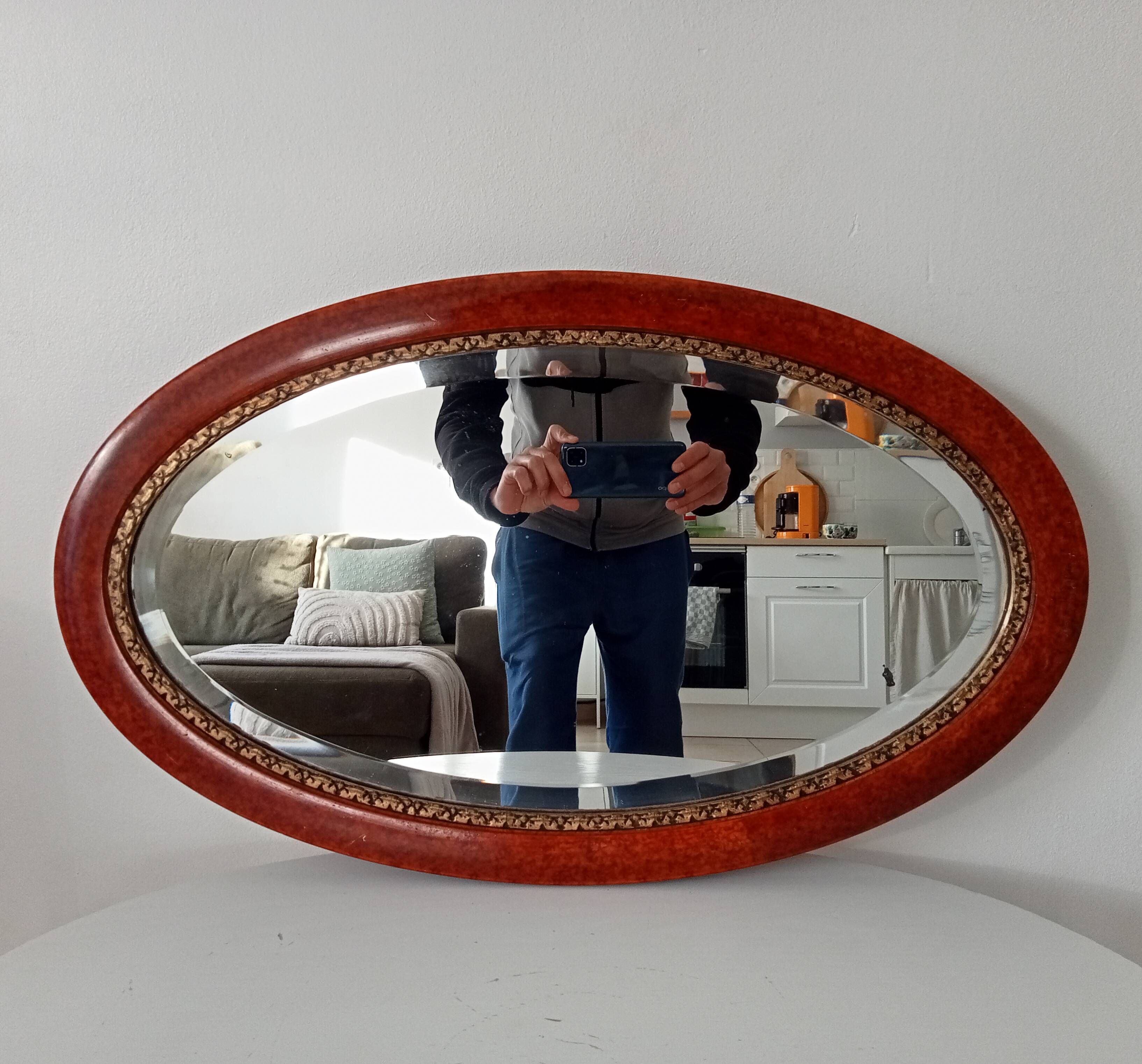 Antique oval mirror with bevelled glass