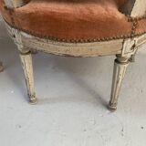 Paire de fauteuils de style Louis XVI en hetre patiné XIX siècle