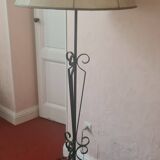 Tripod floor lamp with metal base and skin shade