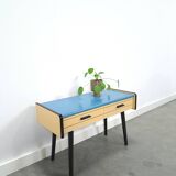 Jaren 50 ladekastje met blauw blad en zwarte poten