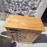 Grain merchant-style furniture with 6 drawers and a cupboard.