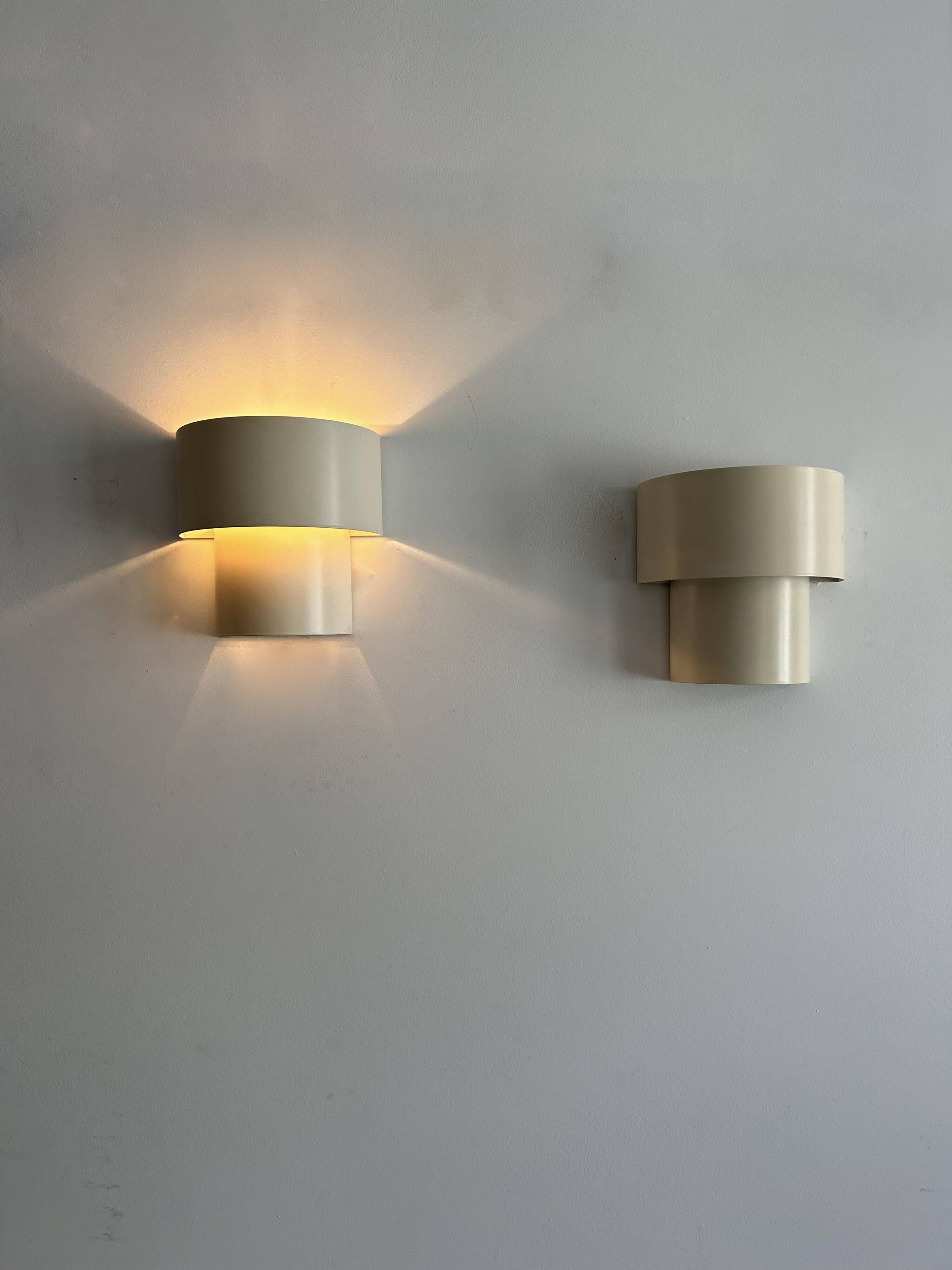 Pair of vintage modernist wall lights, white lacquered metal, Sweden 1970