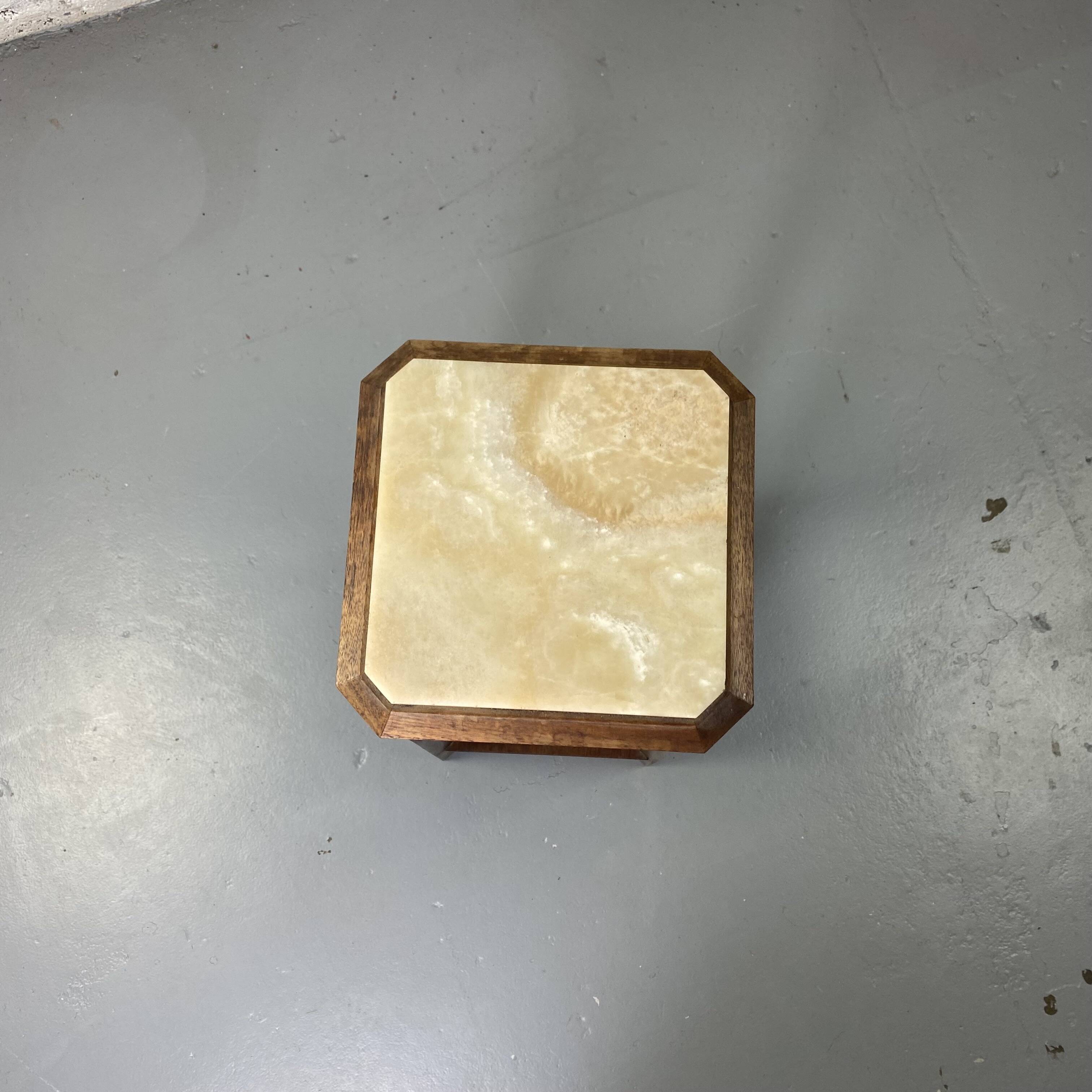 Wooden stool with marble top