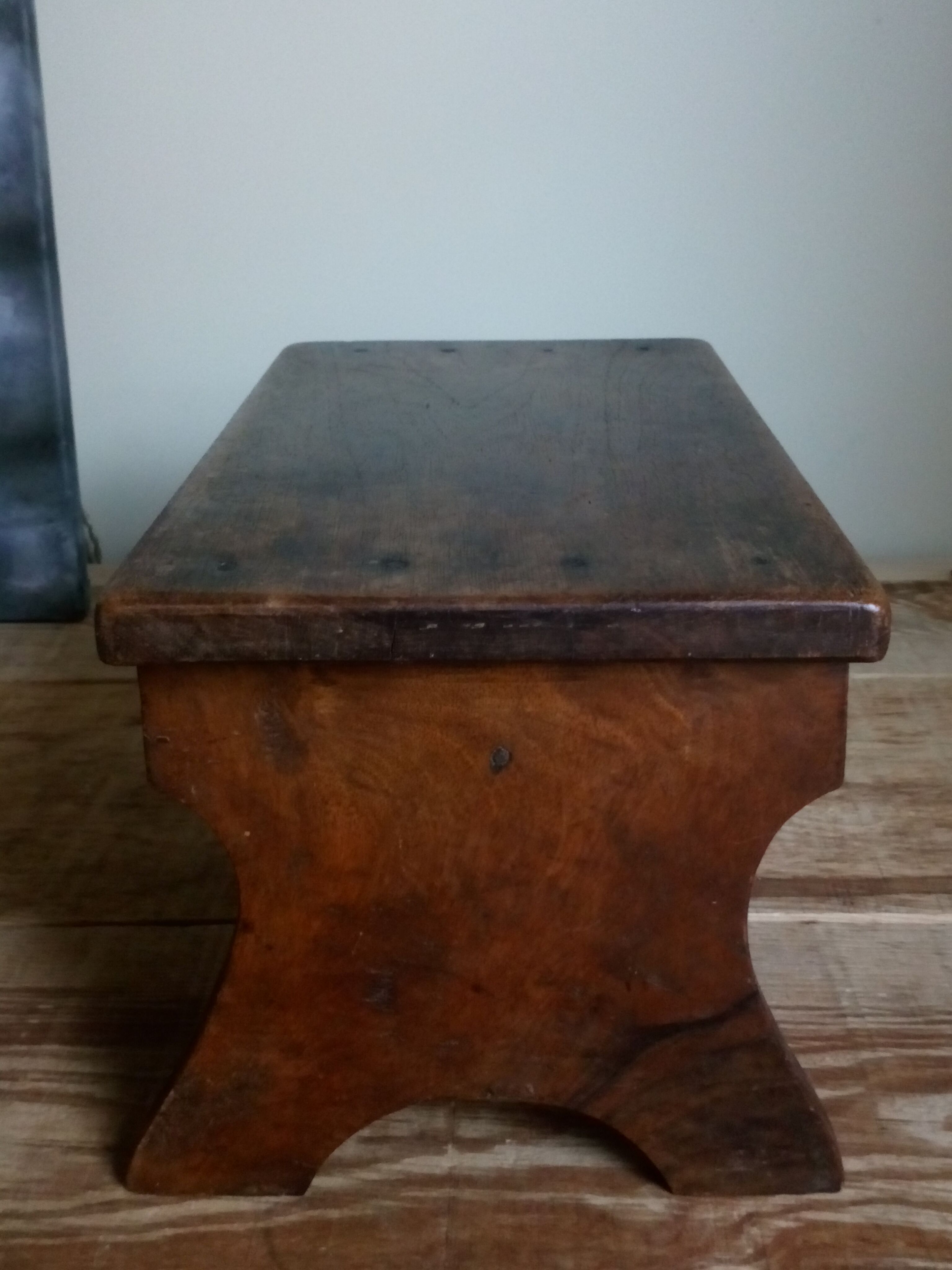 Old solid wood footring bench