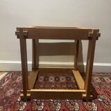 Brutalist table in wood and smoked glass