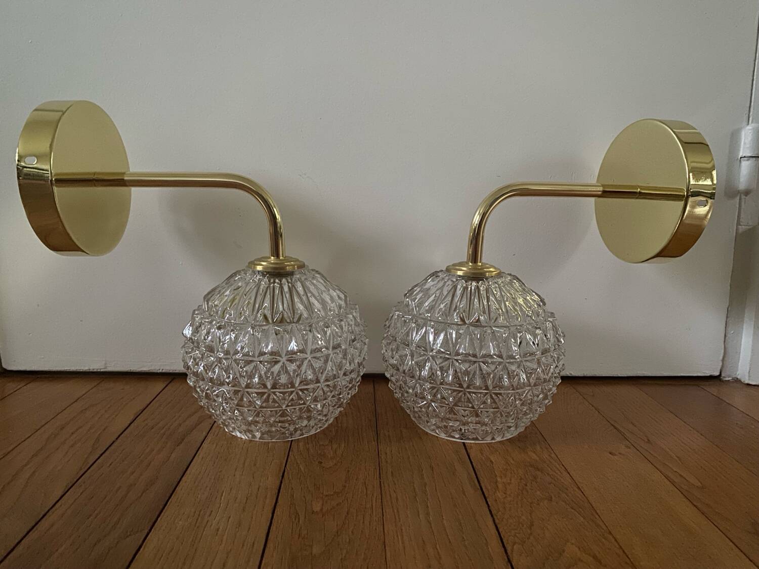 Pair of wall lights with vintage globes