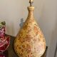 Ceramic lamp with floral decorations