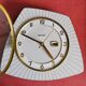 Vintage formica clock silent asymmetrical wall pendulum "Bayard wood lines"