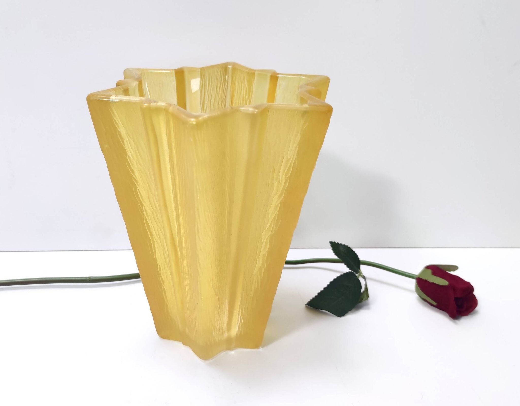 Art deco star shaped yellow glass vase attributed to pierre d'avesn for daum