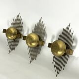 Mid-Century Set of three gilded metal sconces. Italy 1950s