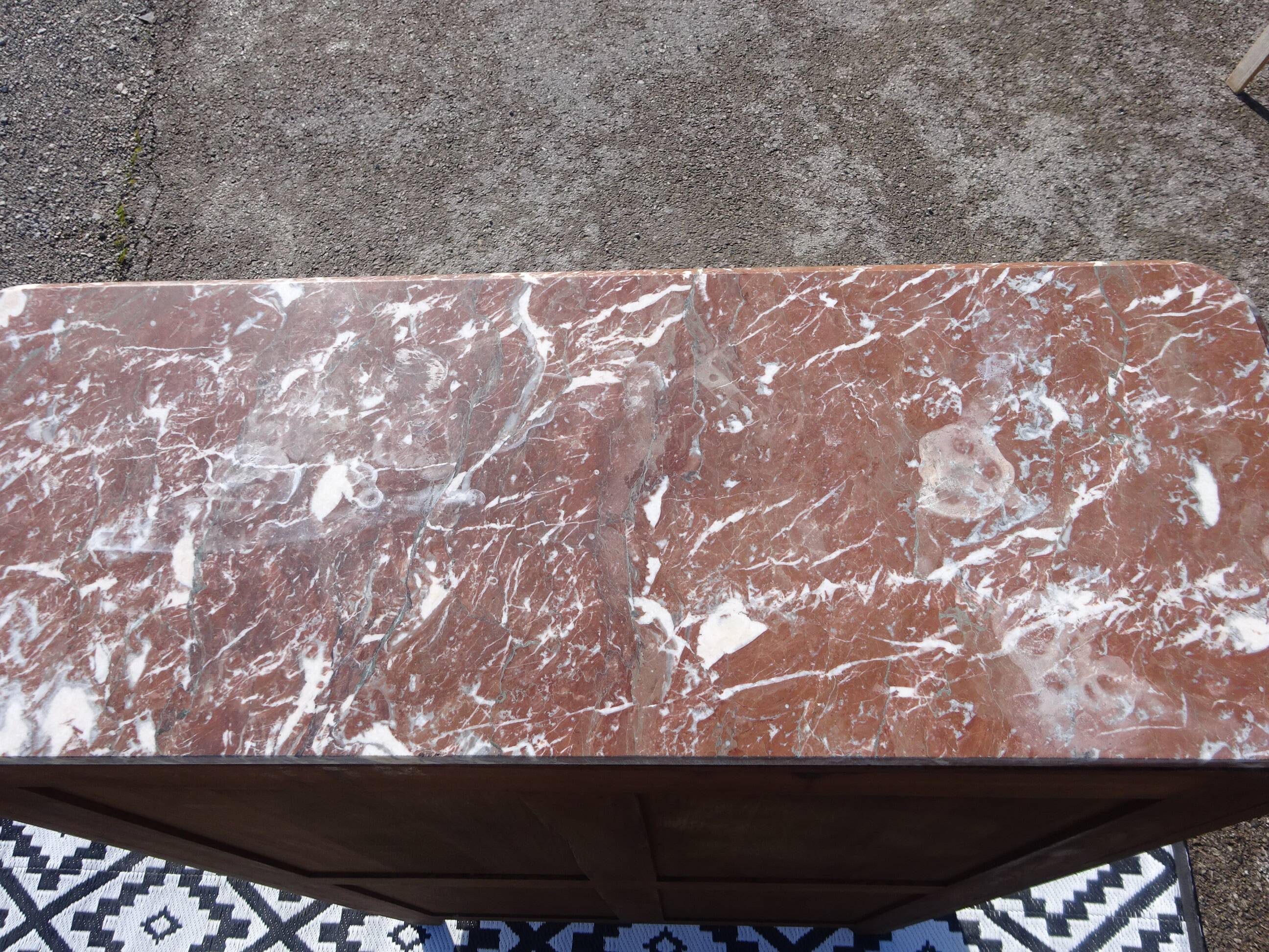 Glass library with rosewood marquetry in the Louis XV style.