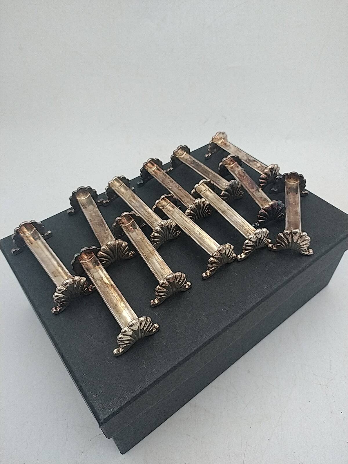 Silver-plated shell knife rests. Ravinet Denfert.