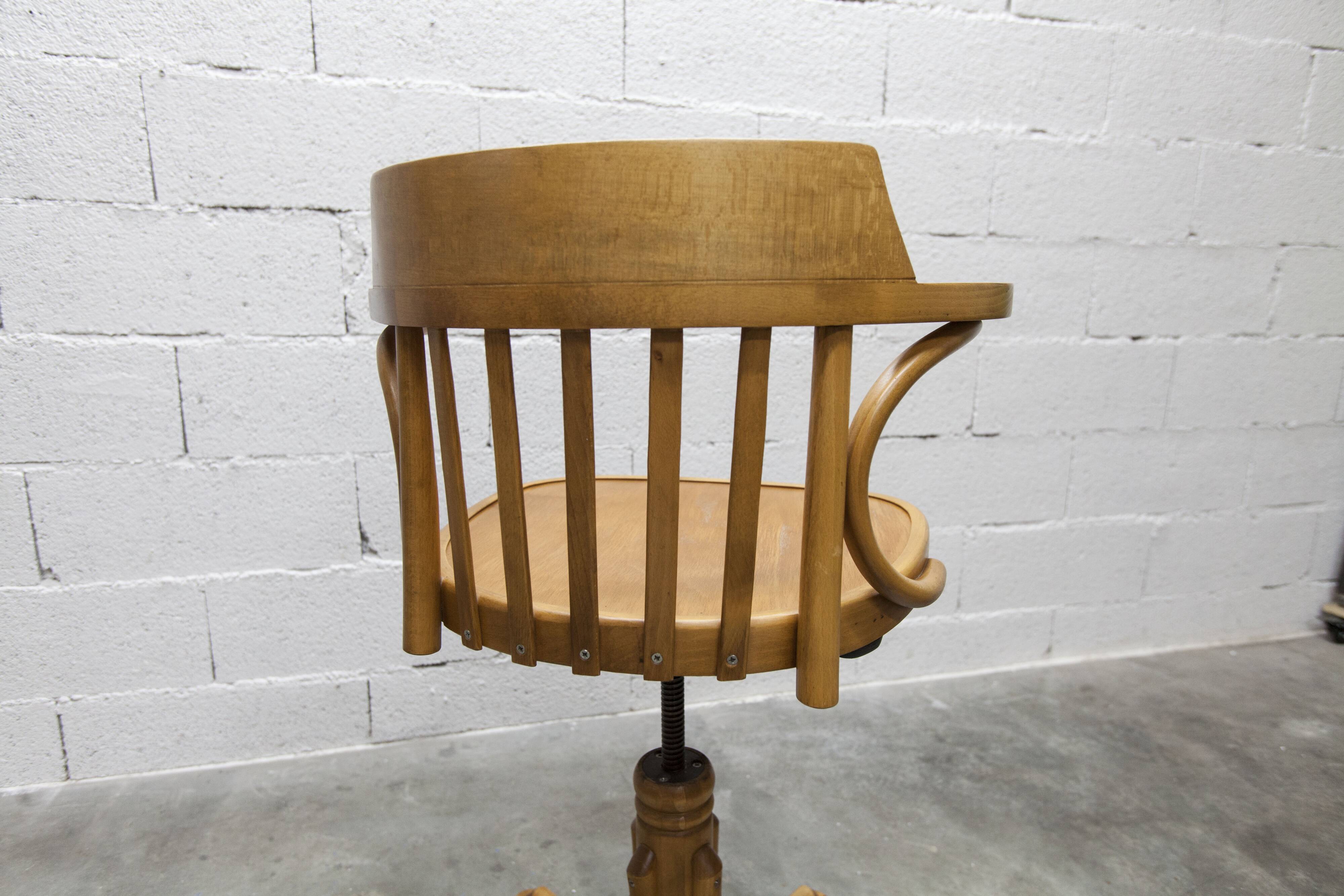Scandinavian 1960s curved wood swivel office chair