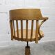 Scandinavian 1960s curved wood swivel office chair