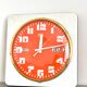 Vintage orange wall clock