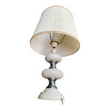 Space age bedside lamp in off-white wood with a metal band.