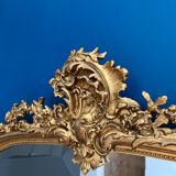 Antique mirror with pediments 141cm/80cm gilded with gold leaf, beveled ice