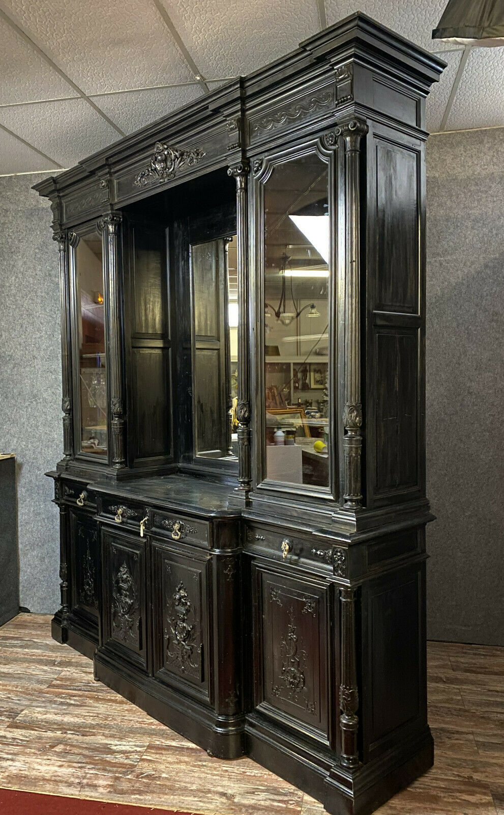 Renaissance Castle library in blackened wood with secret passage around 1850