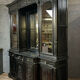 Renaissance Castle library in blackened wood with secret passage around 1850