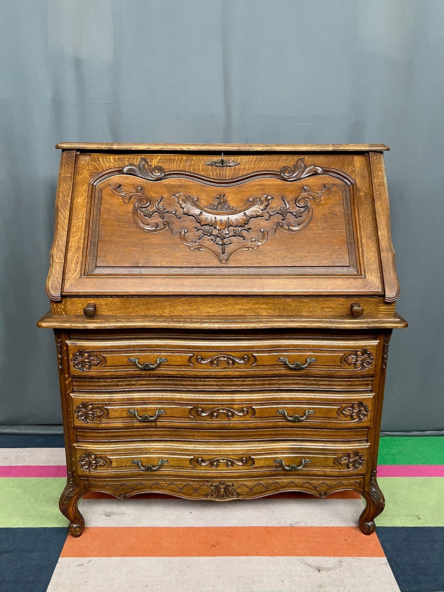 Liège secretary in carved oak in Regency style.