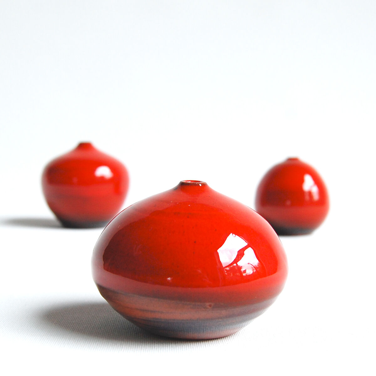 Trio of red ceramics Antonio Lampecco