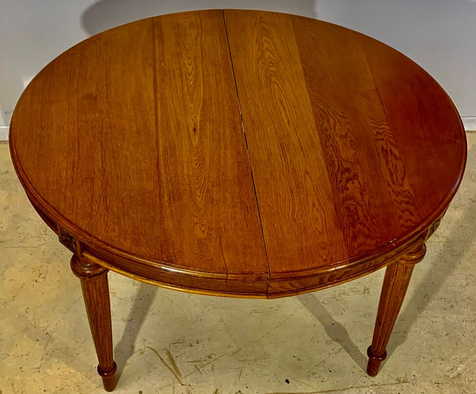 Louis XVI style table in oak with three extensions