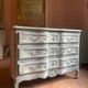 Antique Louis XV style chest of drawers in crossbow shape