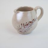 Pair of ceramic milk jugs signed La Roue Vallauris
