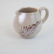 Pair of ceramic milk jugs signed La Roue Vallauris