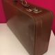 Set 2 vintage suitcases in vulcanized fiber and leather