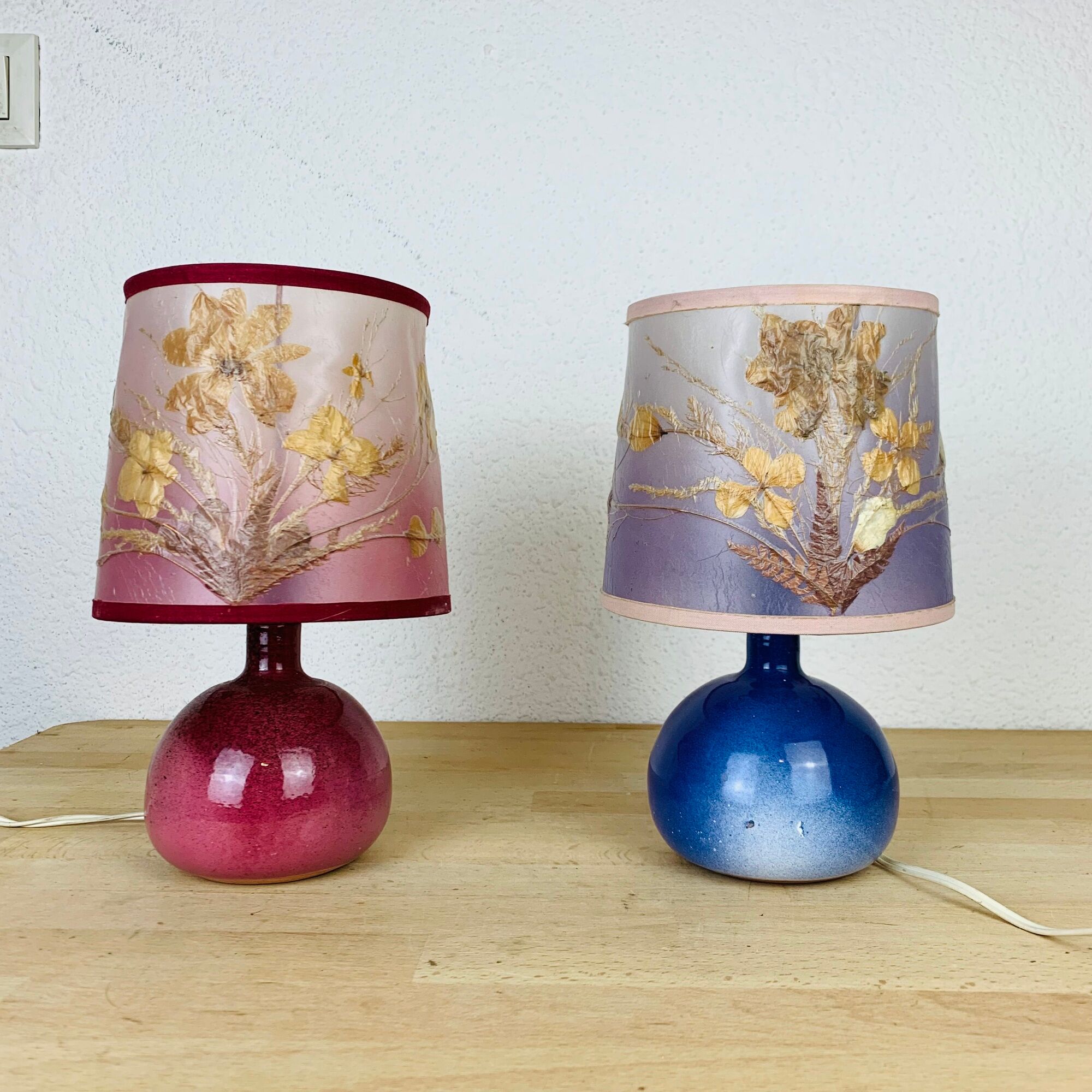 Pair of pink and blue ceramic fig lamps, dried flowers lampshade