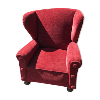 Impressive red velvet eared armchair