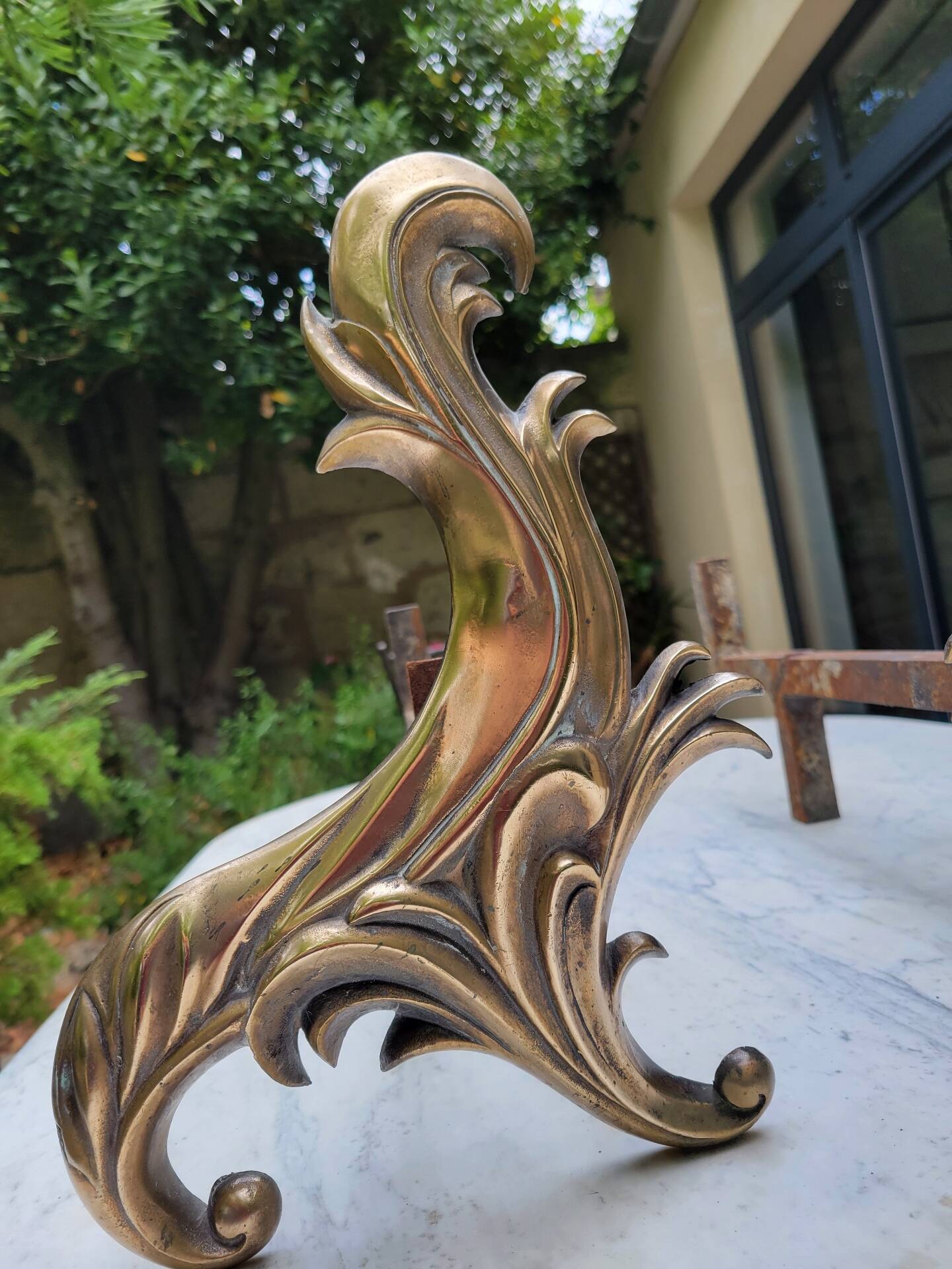 Gilded bronze chenets from the 19th century