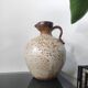 Pyrite stoneware pitcher attributed to Jean-Pierre Prud'homme