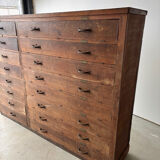 Large wooden workshop cabinet with 16 drawers, antique from the early 1900s.