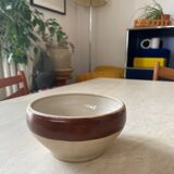 Old stoneware bowl with brown edge