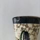 Vintage cream ceramic vase with purple floral decoration and gold highlights