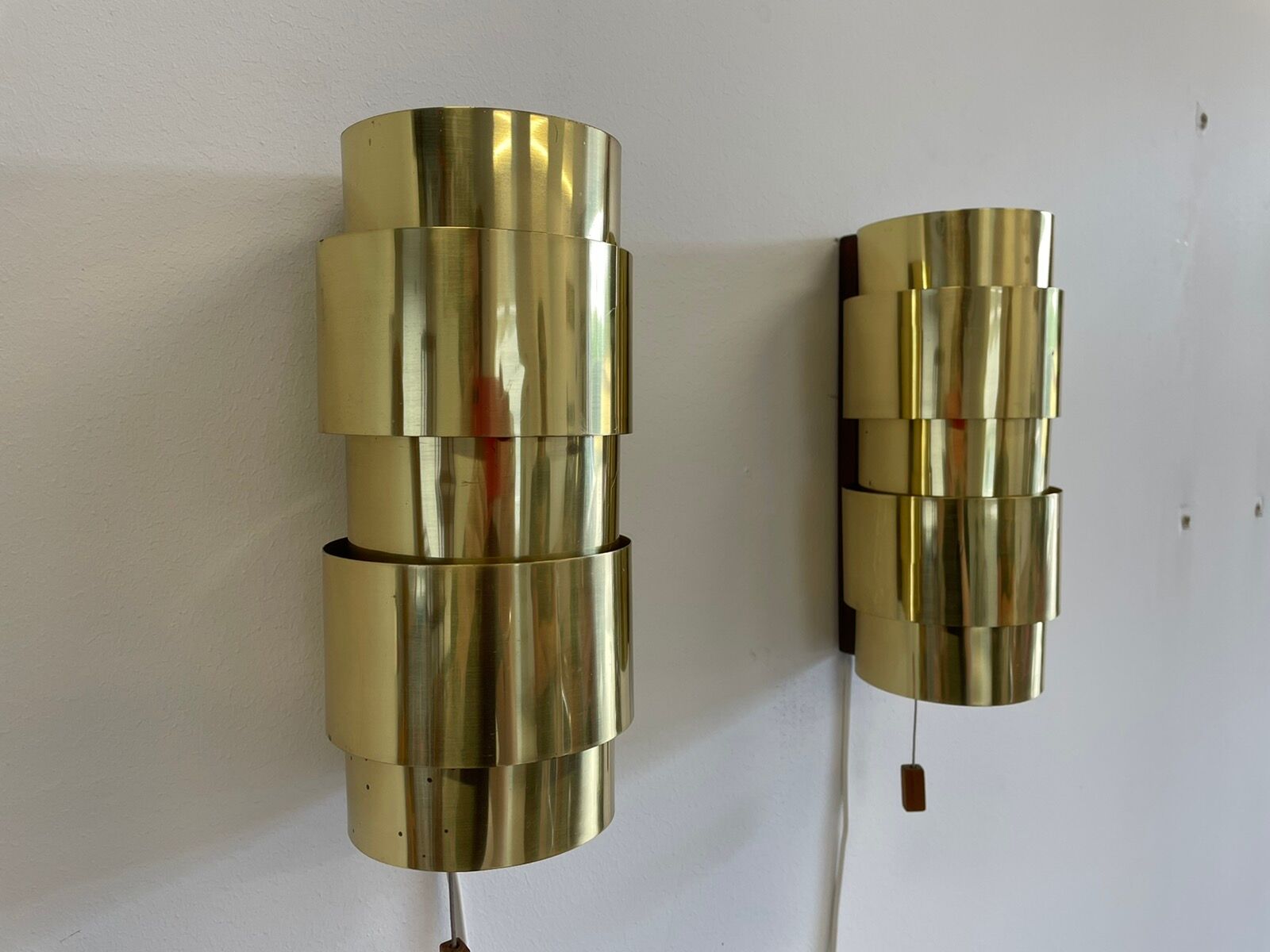 Pair of Scandinavian teak and brass sconces