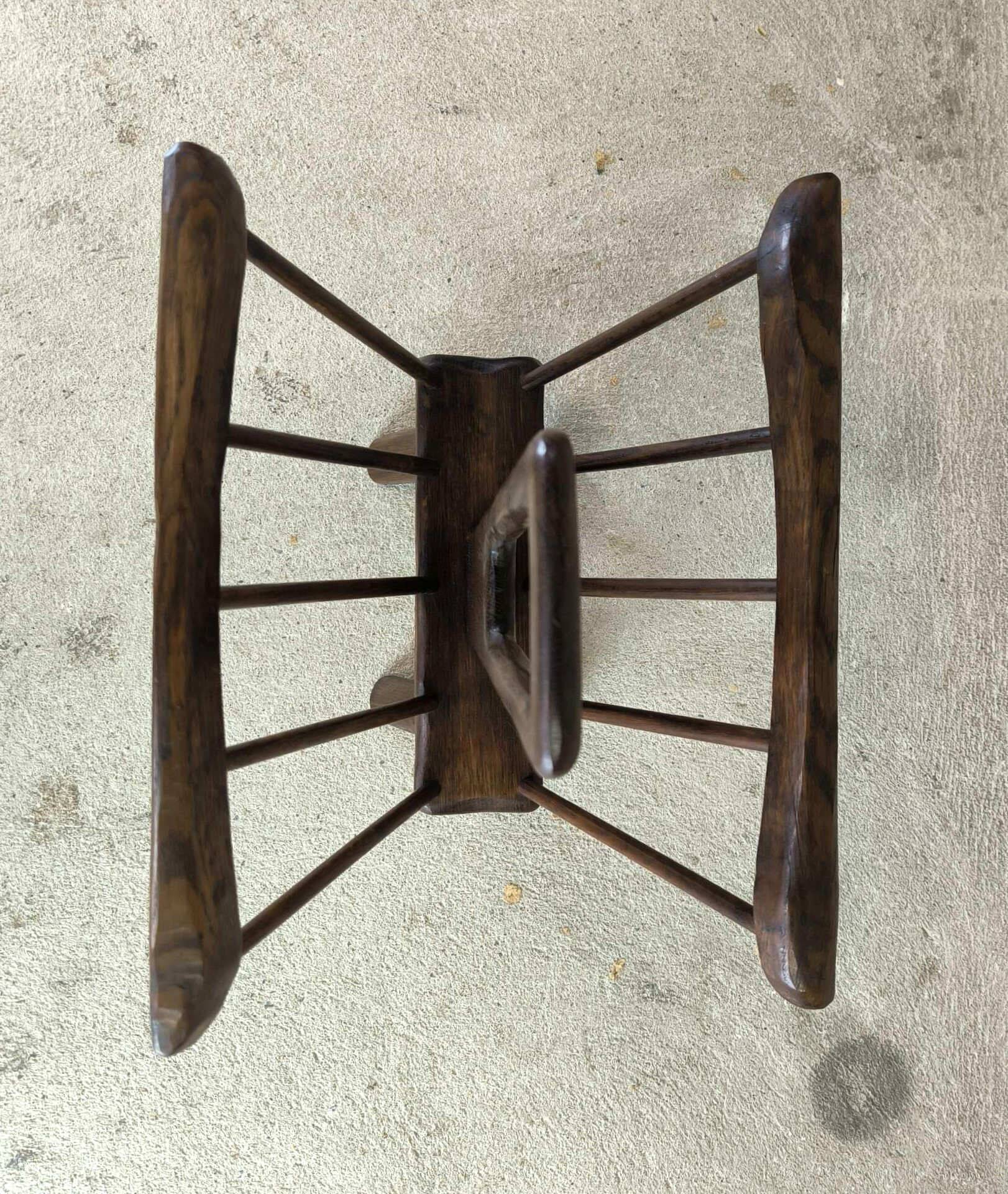 Vintage magazine rack in solid wood.