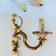 Louis XV bronze wall light with a flowing branch design and acanthus leaf decoration.