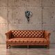 Chesterfield sofa / Brown cognac leather / Deep buttoned / 1980s