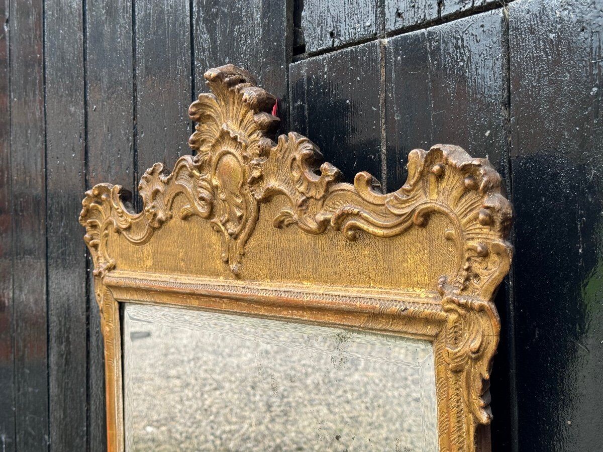 Baroque mirror in carved, stuccoed and gilded wood, Vienna circa 1700