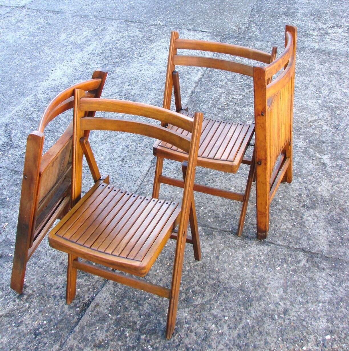 A set of 4 vintage folding wooden chairs, 1970s.