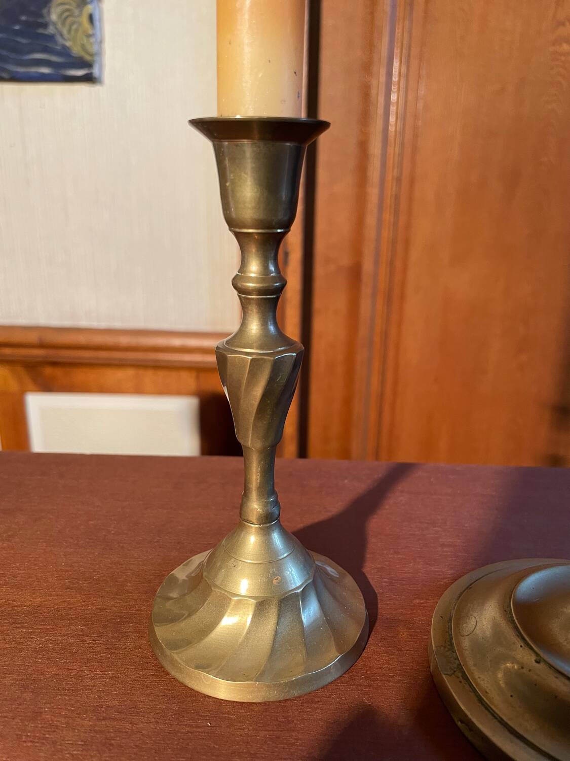 Trio of brass candlesticks