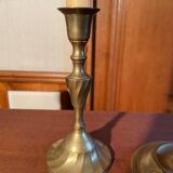 Trio of brass candlesticks