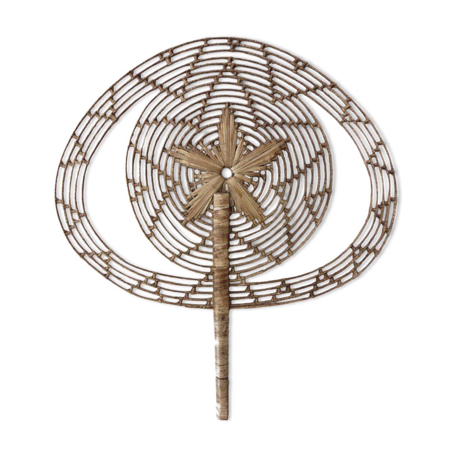 Vintage fan in palm leaves