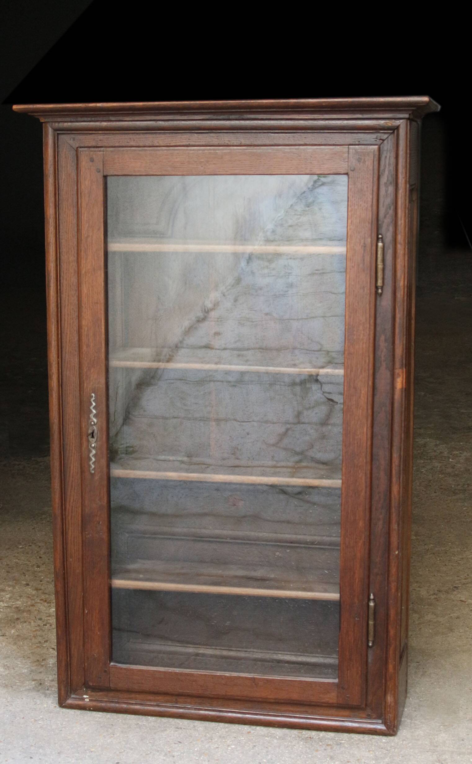 Elegant 18th century solid oak display cabinet.