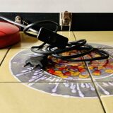 Old articulated desk lamp in red metal