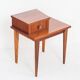 Vintage bedside table. Varnished wood. France, 1960s.