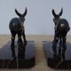 Bookends in the style of stylised donkeys, patinated metal and marble - circa 1940-1950.